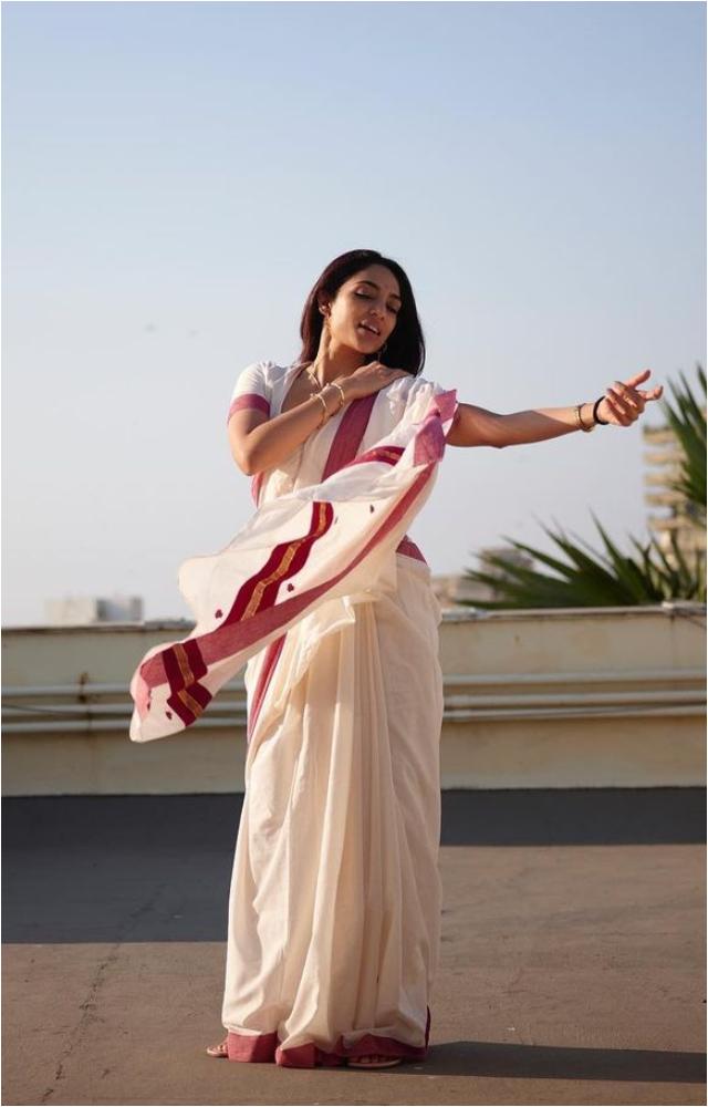 In a white saree adorned with a maroon border, Sobhita Dhulipala exudes simplicity and stunning elegance, setting new standards in saree fashion