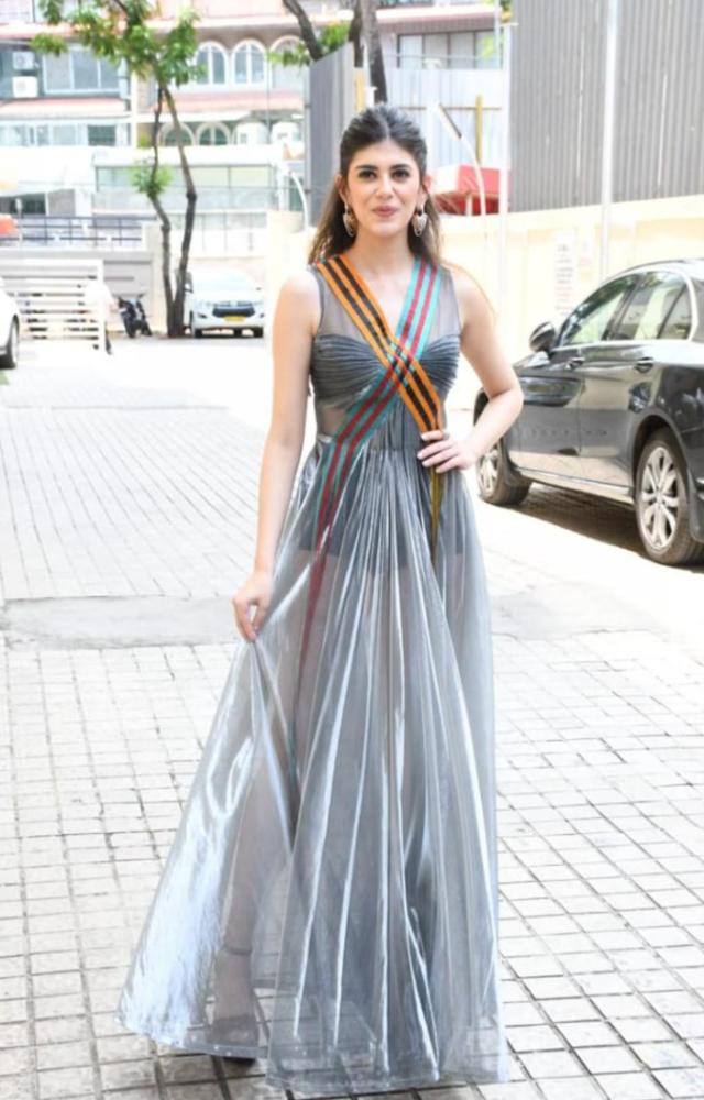 Sanjana stuns in a silver gown, perfect for acing your look at a friend`s wedding