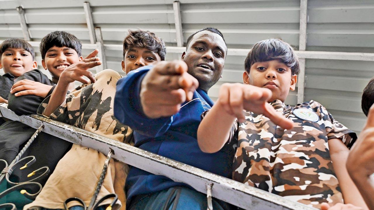 Akash Dhangar aka B-boy Akku is passing on his knowledge of the hip-hop sub-culture to the next generation of Dharavi kids at the Hip Hop Paathshala at Shri Ganesh Vidya Mandir High School, Dharavi. Pic/Ashish Raje