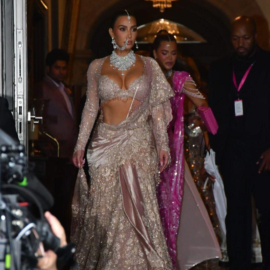Kim Kardashian was seen in an ivory lehenga while Khloe wore a gorgeous pink ensemble