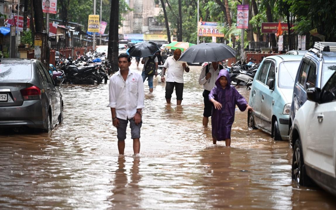 Mumbai rains: Train services and University exams cancelled amid heavy downpour