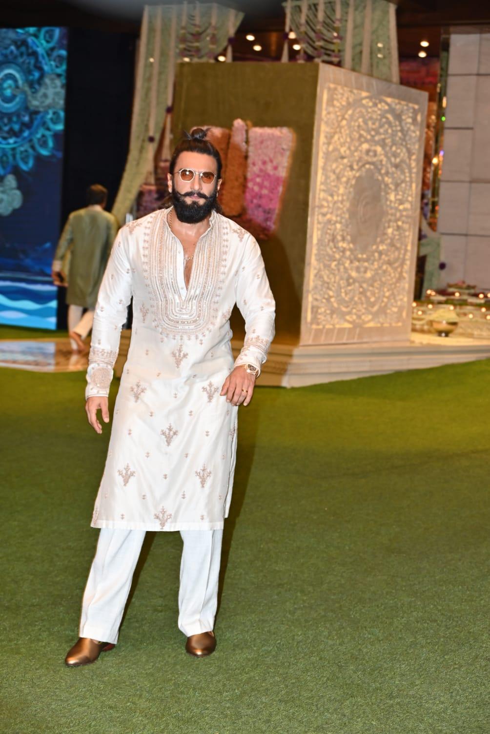 Ranveer Singh, who has been attending all the festivities, aced his look in a printed white kurta paired with matching pants