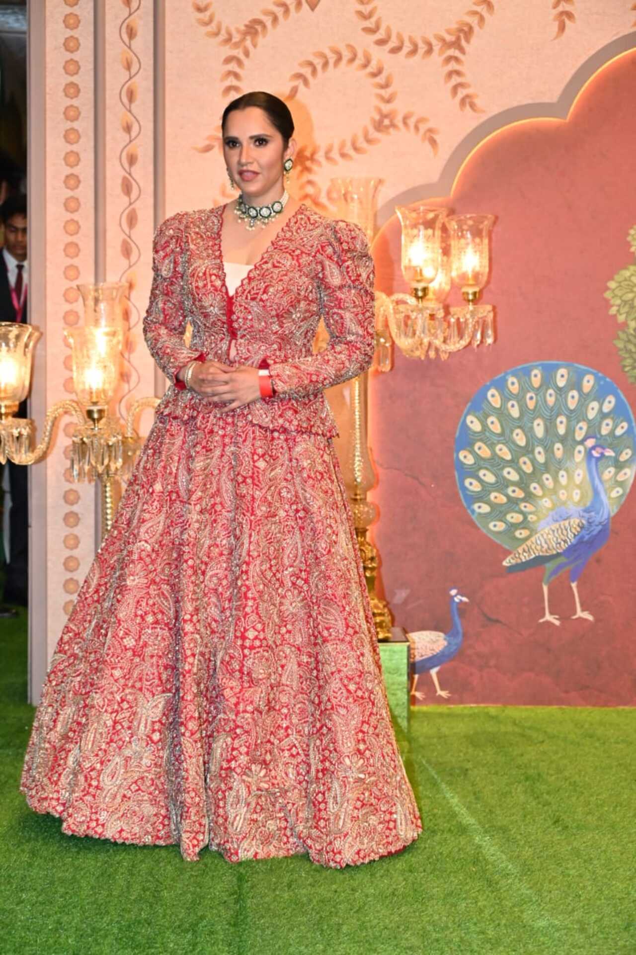 Sania Mirza wore a heavily embroidered red skirt paired with a matching top. Her Indo-western look is something we would like to take notes from