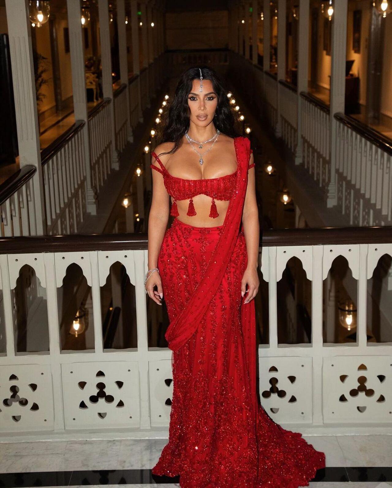 Kim Kardashian, who visited India for the first time, wore a stunning red saree paired with a strappy blouse