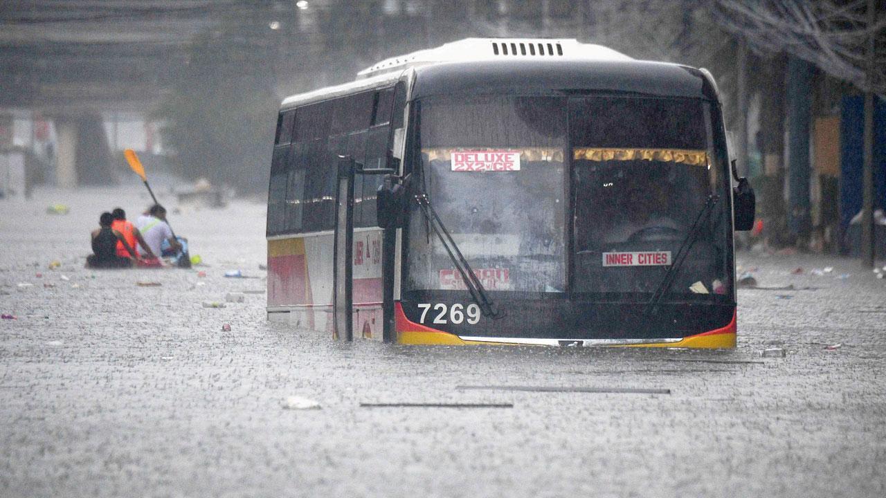 Taiwan readies for typhoon that killed 13 in the Philippines