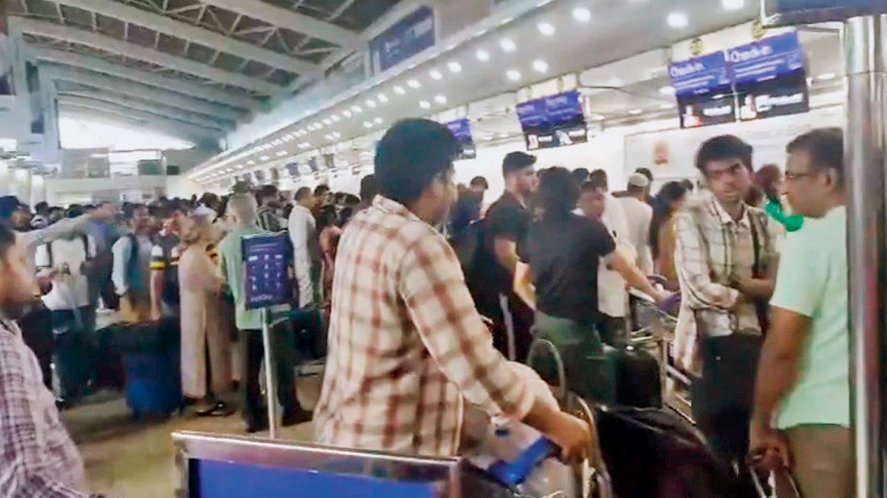 Stranded passengers at the Chhatrapati Shivaji Maharaj Domestic Airport in Santacruz