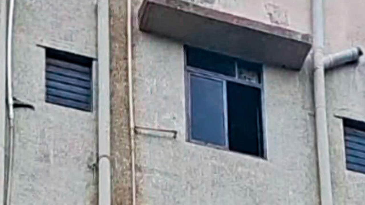 The fourth-floor window the victim was allegedly pushed off 