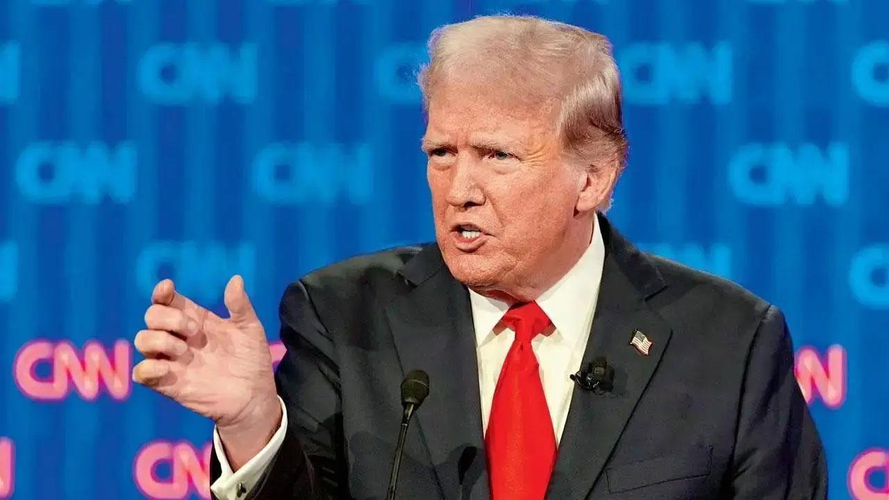 Trump turns his full focus on Harris at first rally since Biden's exit from 2024 race