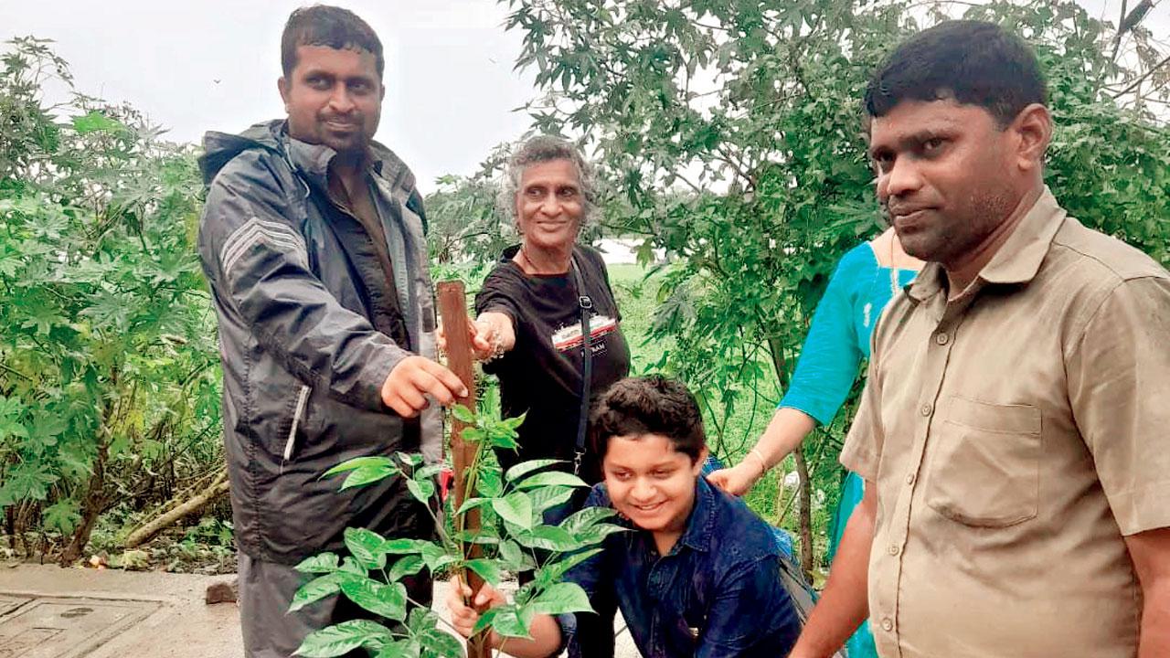 Zidaan Castellino plants trees during a  previous plantation drive in Malad