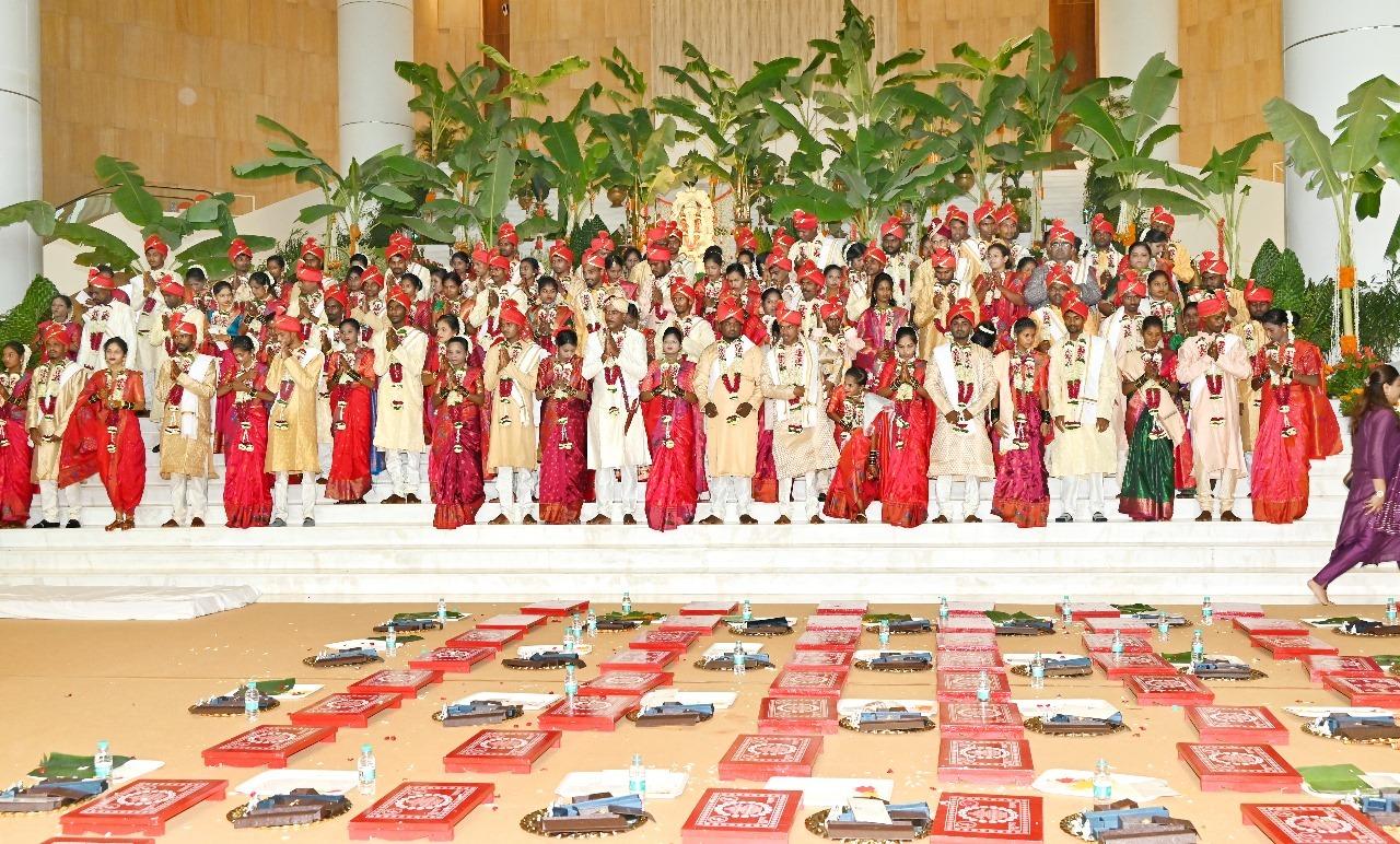 The couples pose after the wedding ceremony