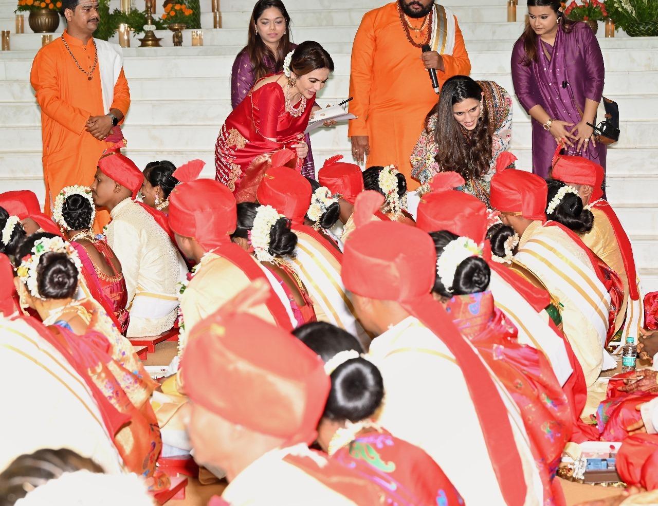 Nita Ambani greets the couples who got married today