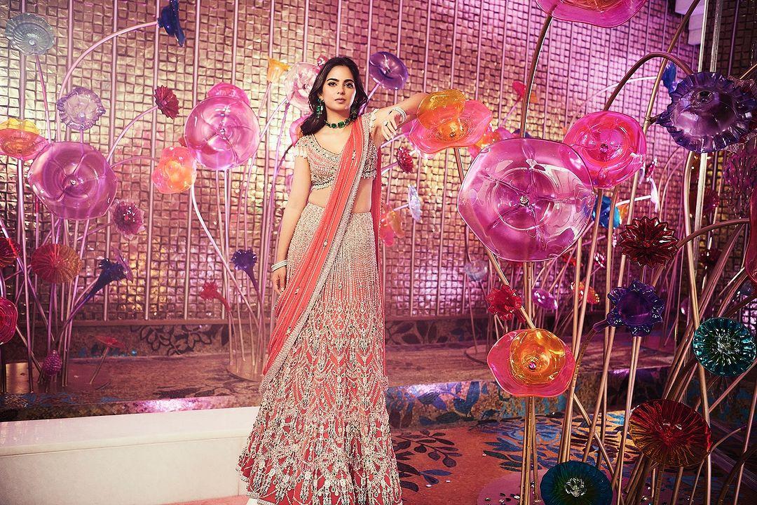 The designer explained that the ensemble included a tulle skirt and a matching blouse, both adorned with a mix of Swarovski crystals, and silver stones