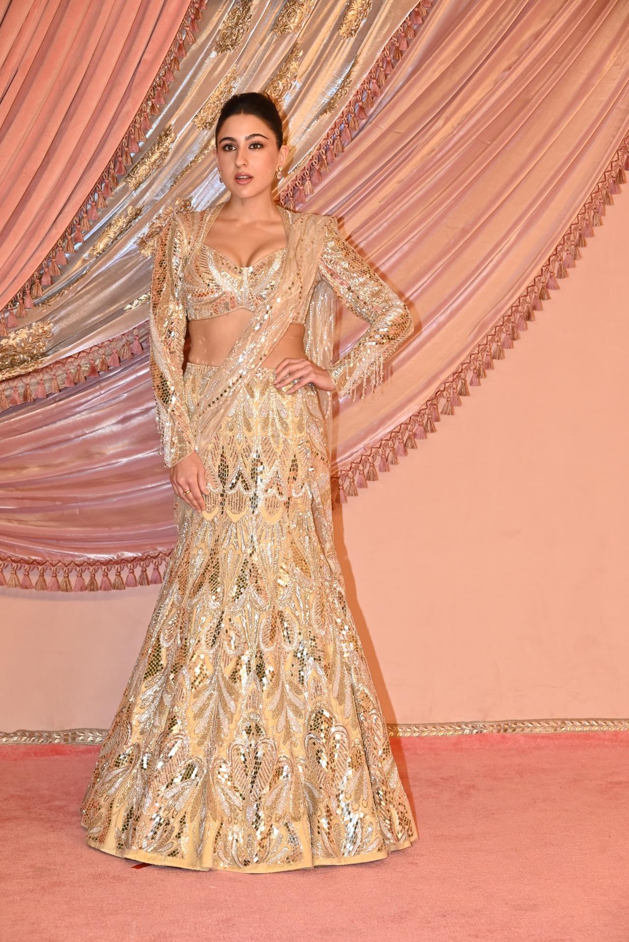 Pataudi princess Sara Ali Khan stole the limelight in a shimmery golden saree, enough to blind the shutterbugs. 
