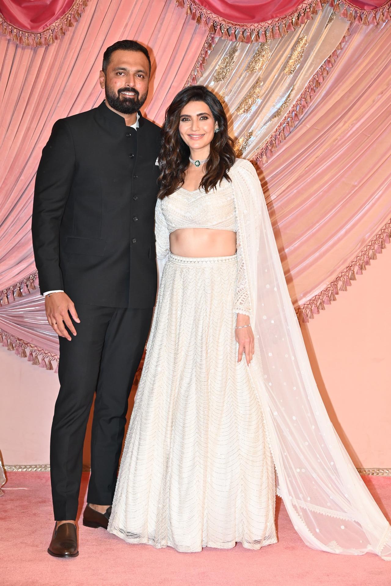 'Scoop' fame Karishma Tanna was a vision in white alongside her husband Varun Bangera. 