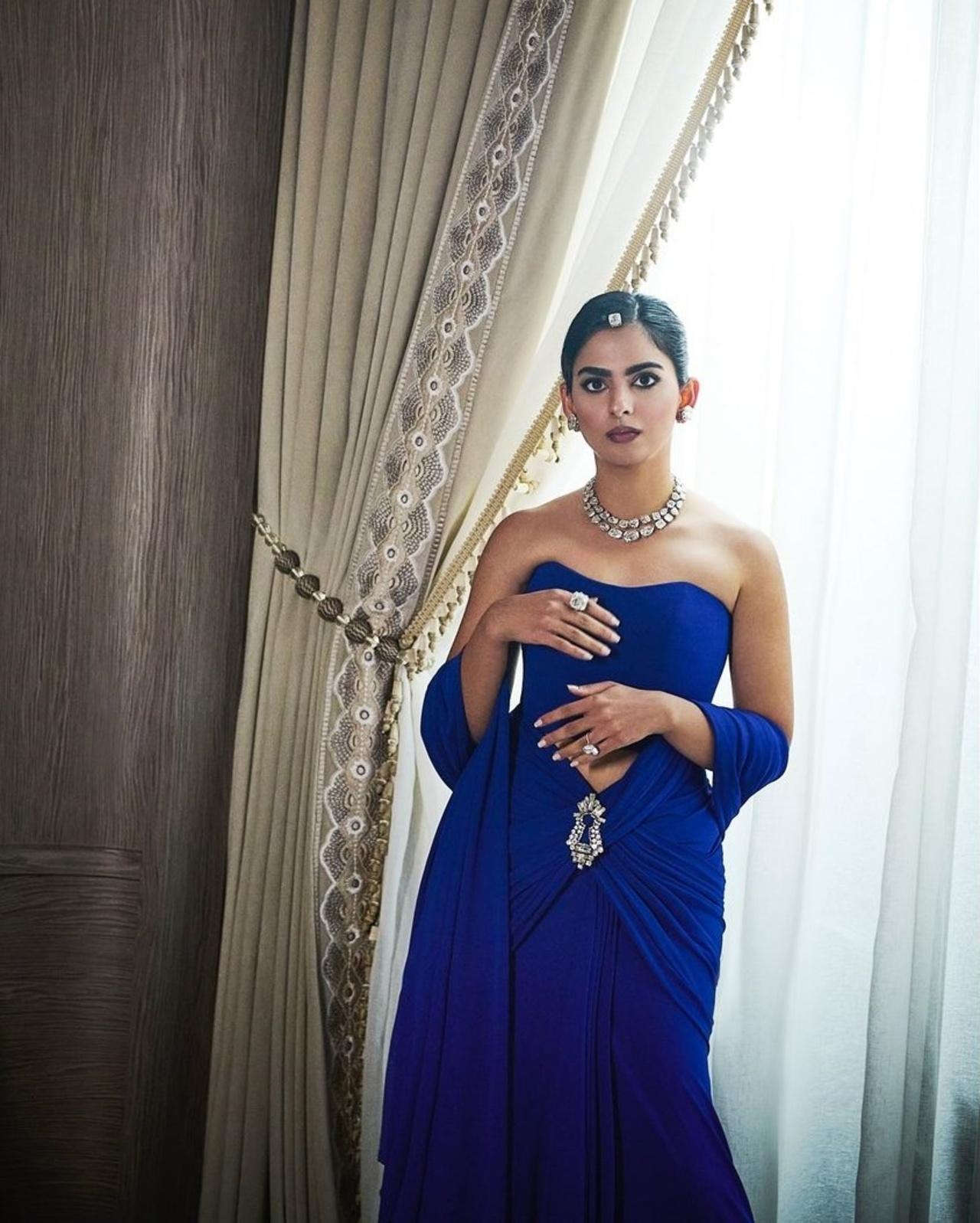 Isha stunned in the couture that was very 2024 and switched the hood with a strapless blouse. 