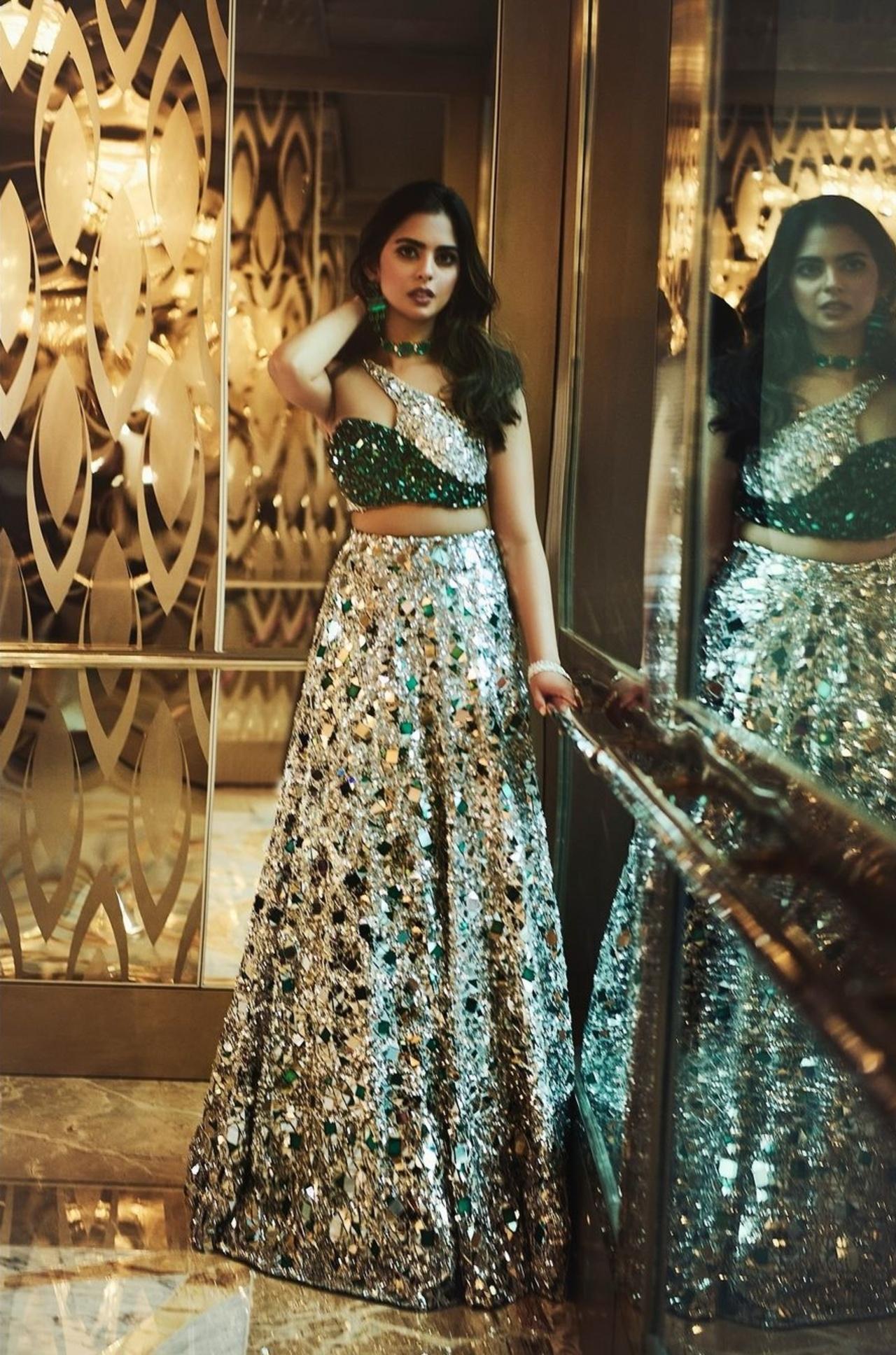 Her third look was a custom Manish Malhotra silver lehenga paired with an asymmetrical one-shoulder blouse.