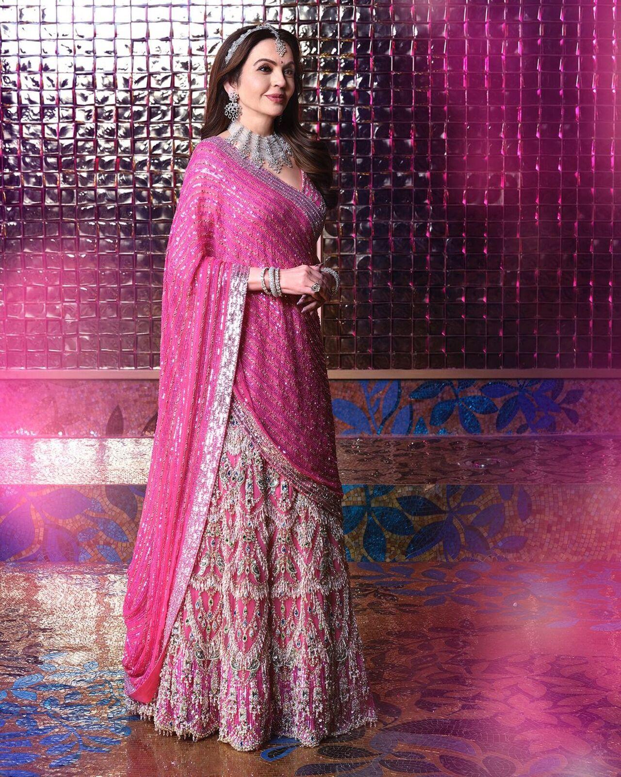 Nita Ambani stunned in a custom  Falguni and Shane Peacock lehenga jewelled lehenga. 