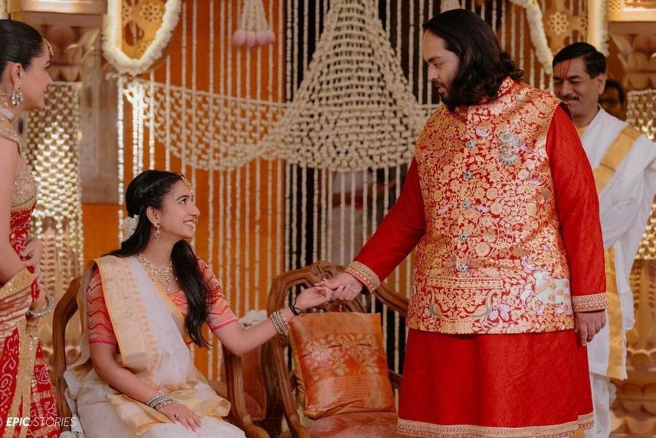 The graha shanti puja saw Anant in a red and golden ensemble by Manish Malhotra. 