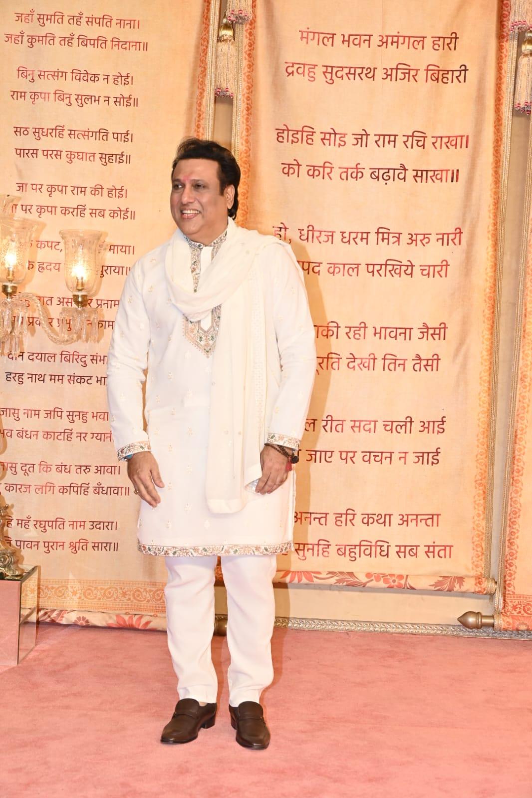 Govinda arrived for the reception in a white structured kurta