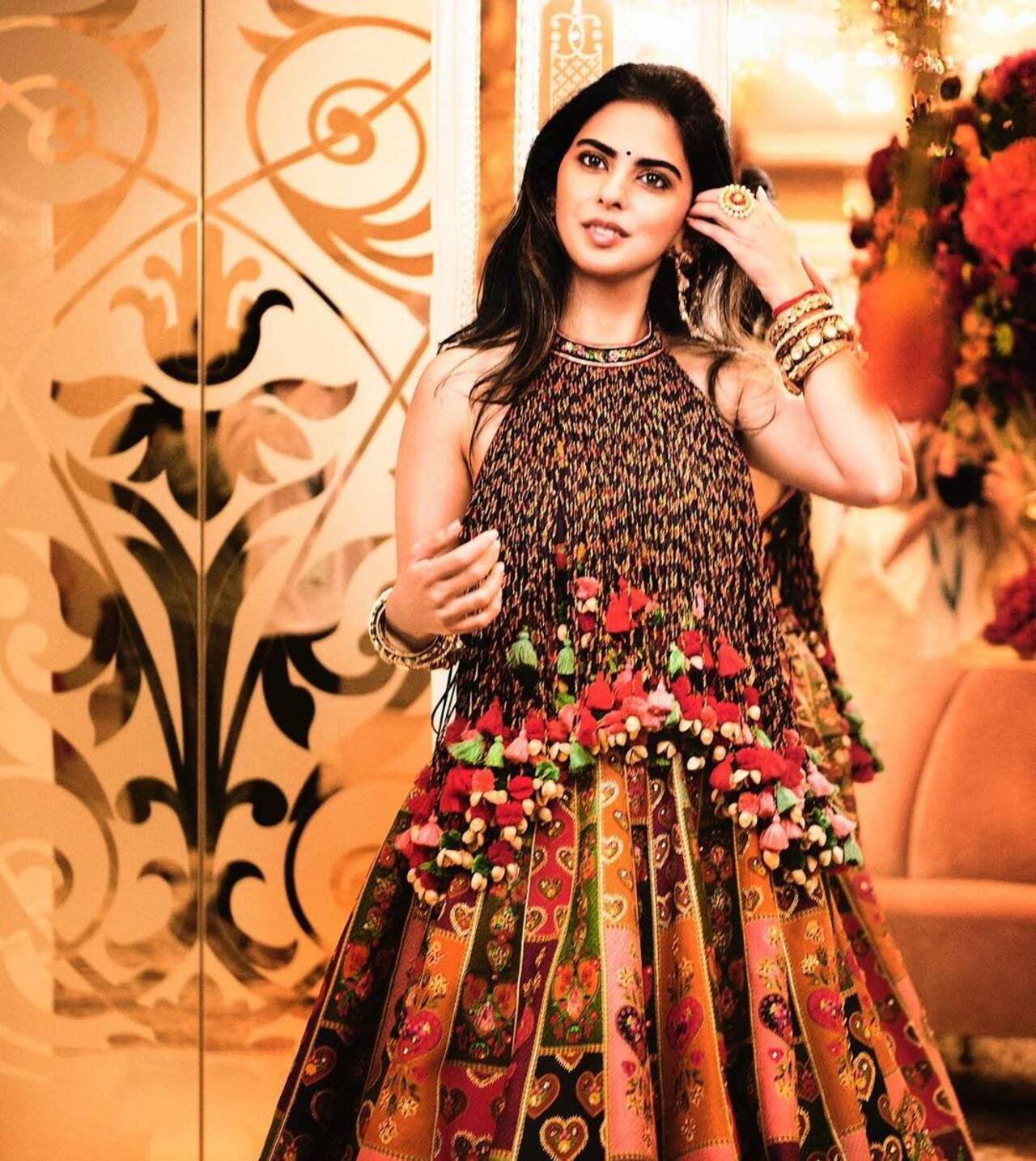 She accessorised her look with statement earrings and bangles and was all smiles.