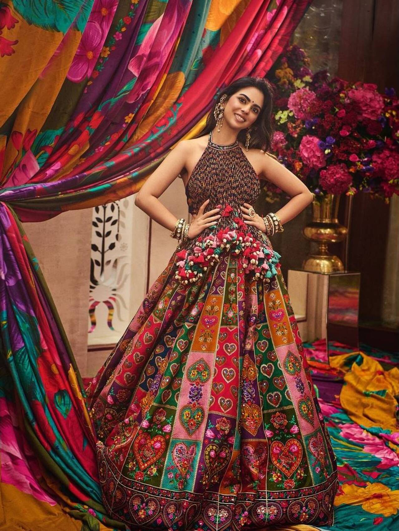 For the Haldi ceremony, Isha Ambani Piramal wore a custom-made Torani panelled lehenga with a tassel detail top inspired by the label’s Dil Rang lehenga.