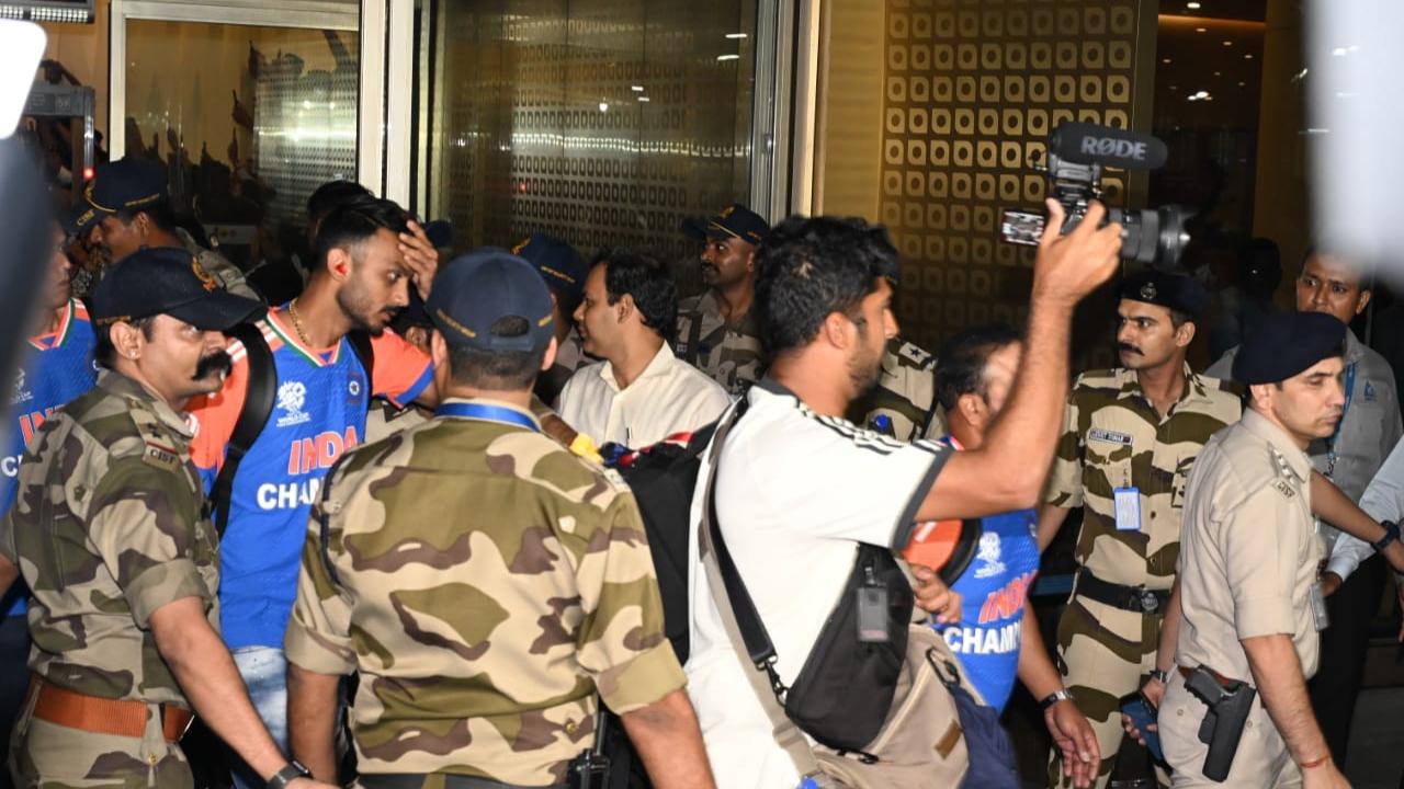 Axar Patel steps outside the airport after receiving a warm welcome from fans