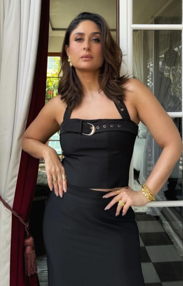 Kareena`s looks for film promotions are a visual treat. Take for instance this black co-ord set with a belt used for its neckline. 