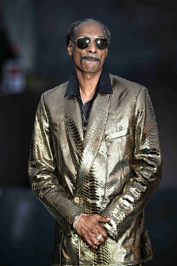 Snoop Dogg wowed at the Paris Olympics not just for wearing this suit but also as a torch bearer!