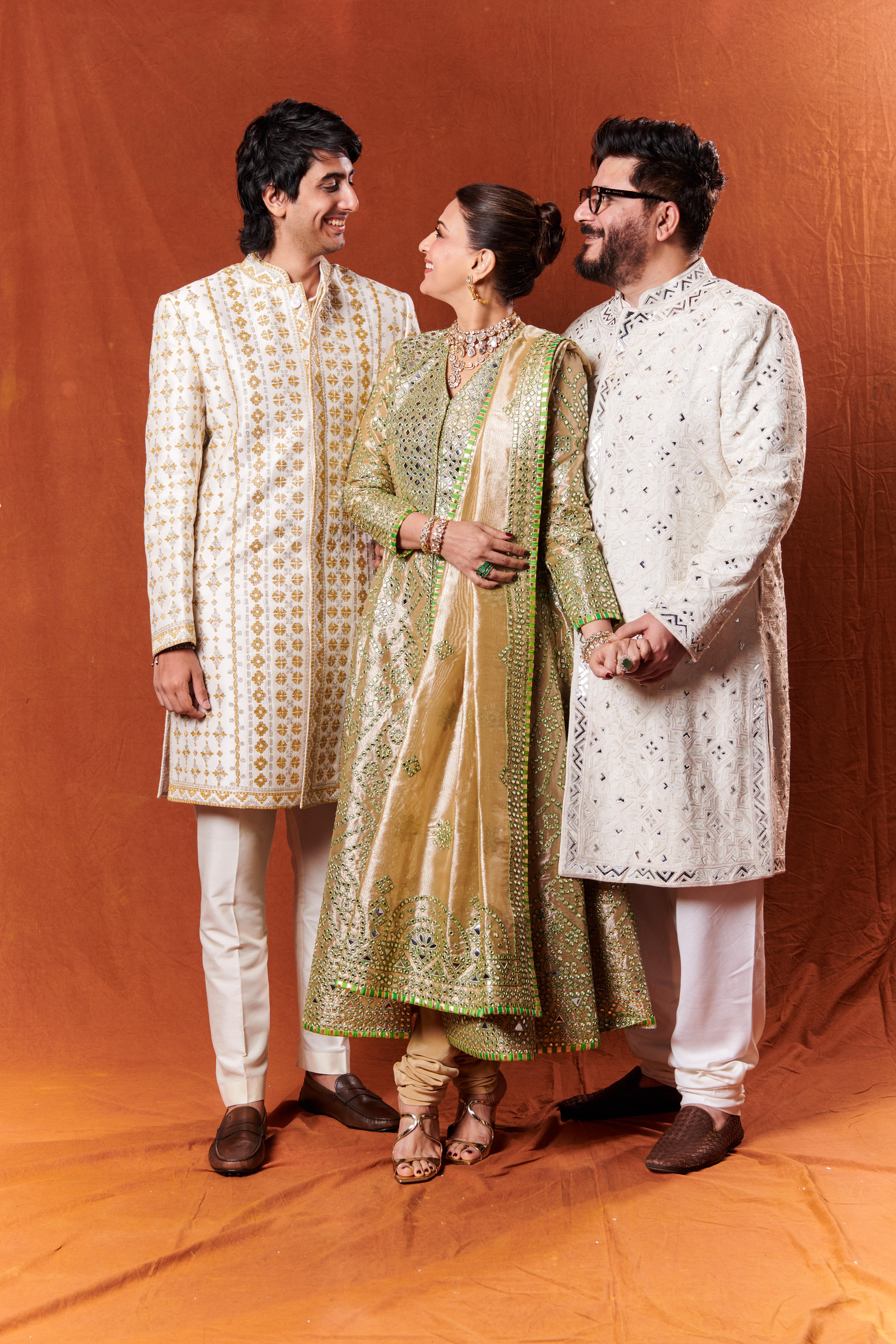 Sonali Bendre wears Asal by Abu Sandeep for Anant Ambani and Radhika Merchant’s wedding ceremony. Her tissue jaali flared sherwani is embroidered with impossibly fine mirrors enhanced with Resham.