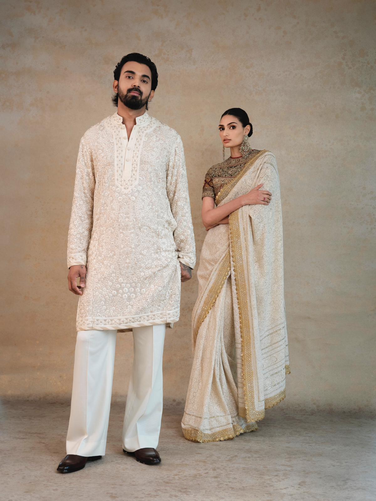 Athiya Shetty’s ivory saree from the designer Abu Jani Sandeep Khosla was a showstopper. 