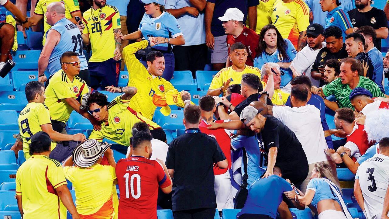 Ugly scenes mar beautiful game as players, public clash in the stands