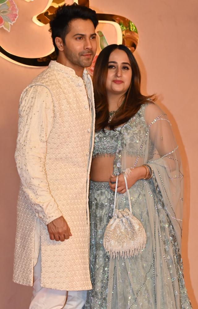Varun Dhawan and Natasha Dalal, the new parents in B-town, too, posed for shutterbugs. Varun wore an ivory kurta while Natasha donned a beautiful lehenga.