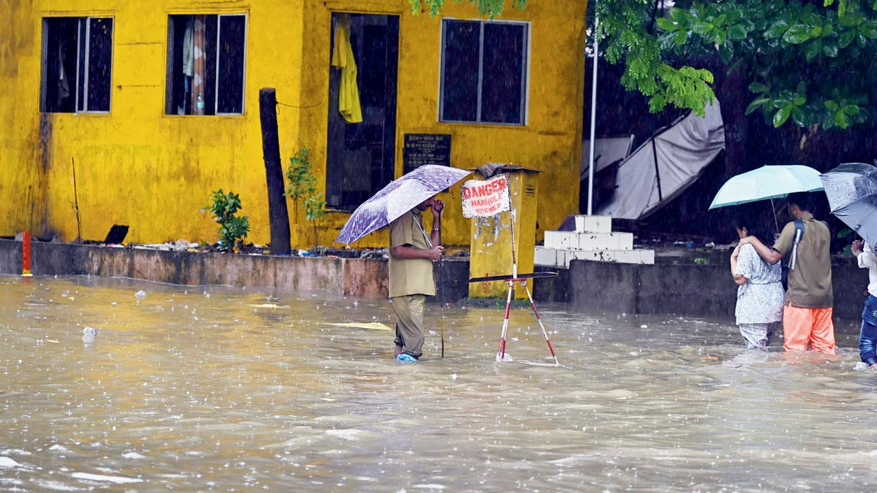 Flooded road after heavy rain at Hindmata in Parel. Pic/Ashish Raje