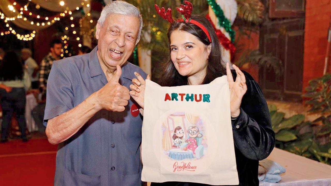 A participant poses with his block  printed tote bag at a Mumbai session