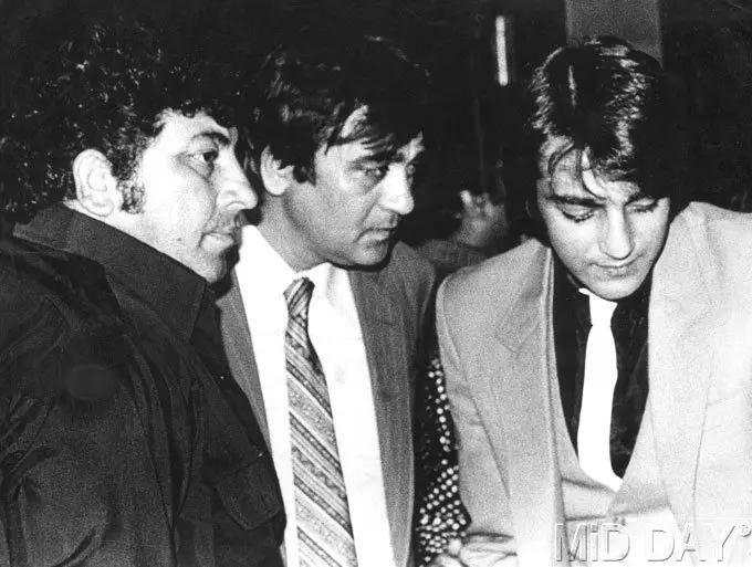 Sunil and Sanjay Dutt with the late Amjad Khan at an event