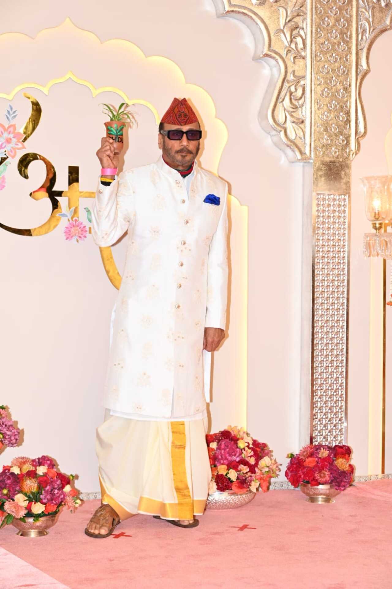 Jackie Shroff donned a white kurta and mundu for the occasion and was seen carrying a sapling