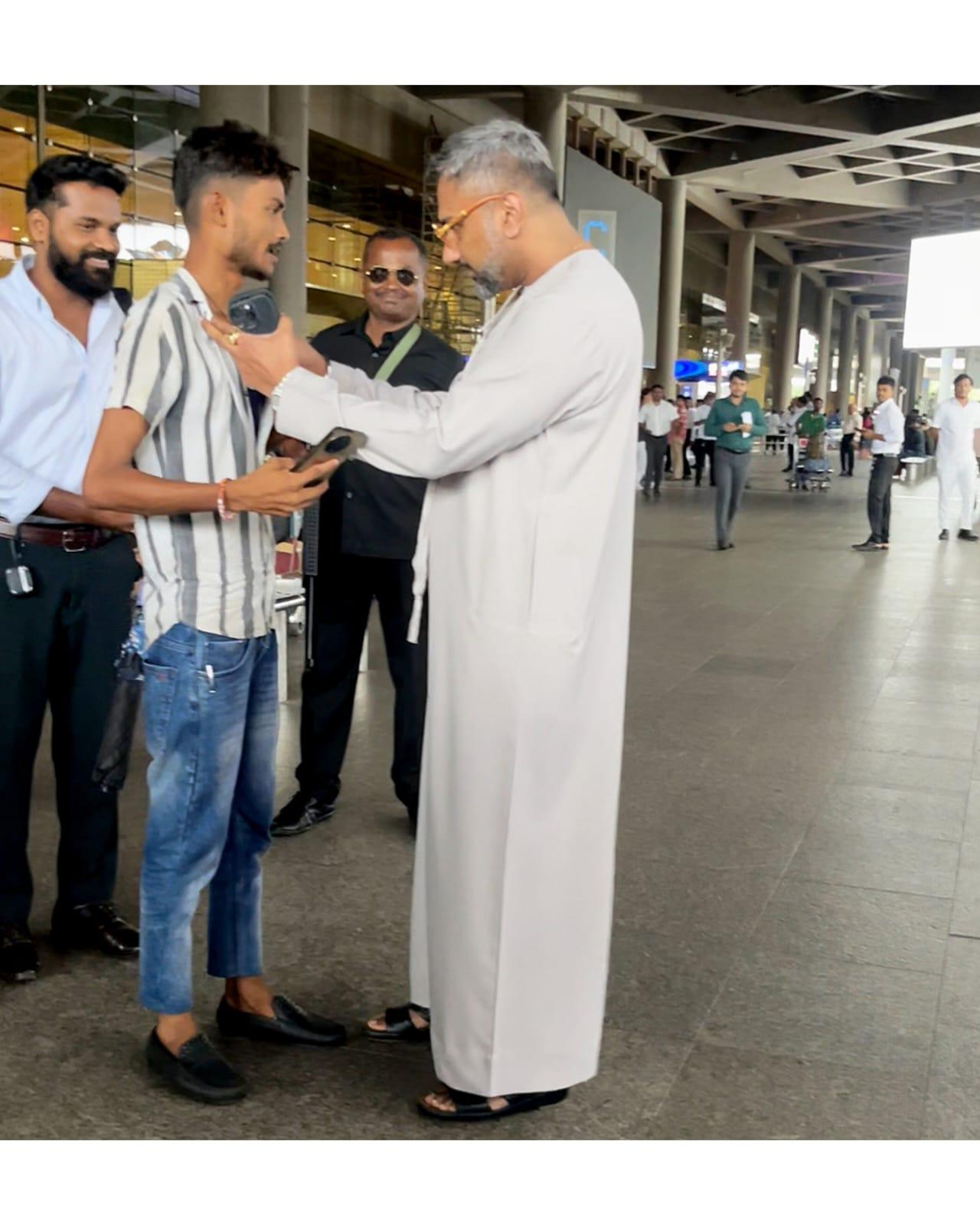 Yo yo Honey Singh was seen greeting fans at the airport as he reached for Ambanis' special day