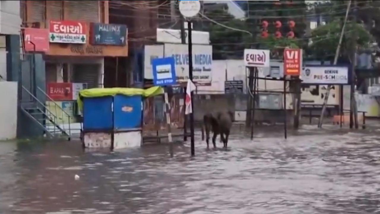 People were seen wading through the waterlogged streets even as the downpour continued its onslaught. 