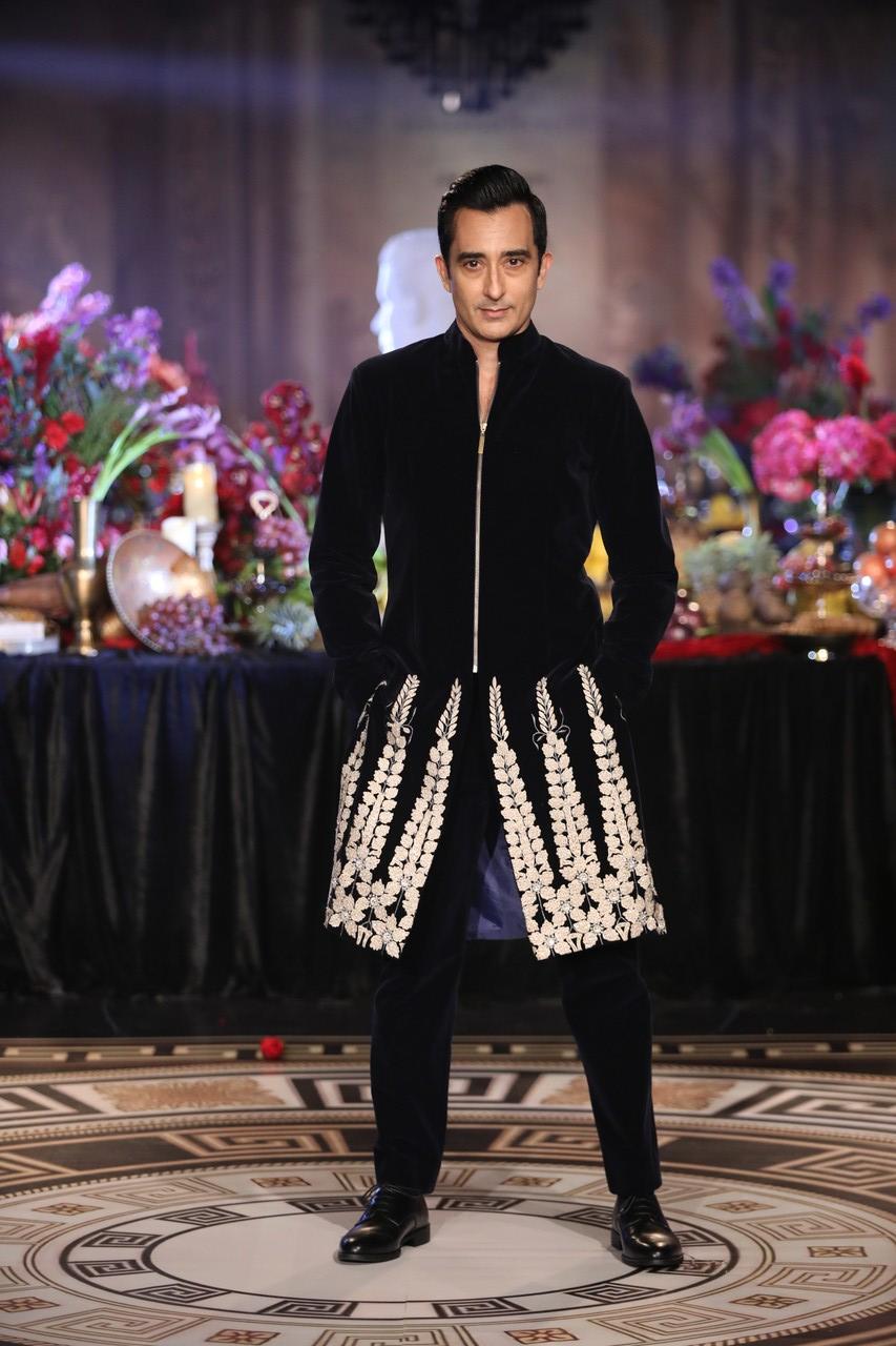 Actor Rahul Khanna also walked the ramp for Tytler's collection wearing a black velvety sherwani.