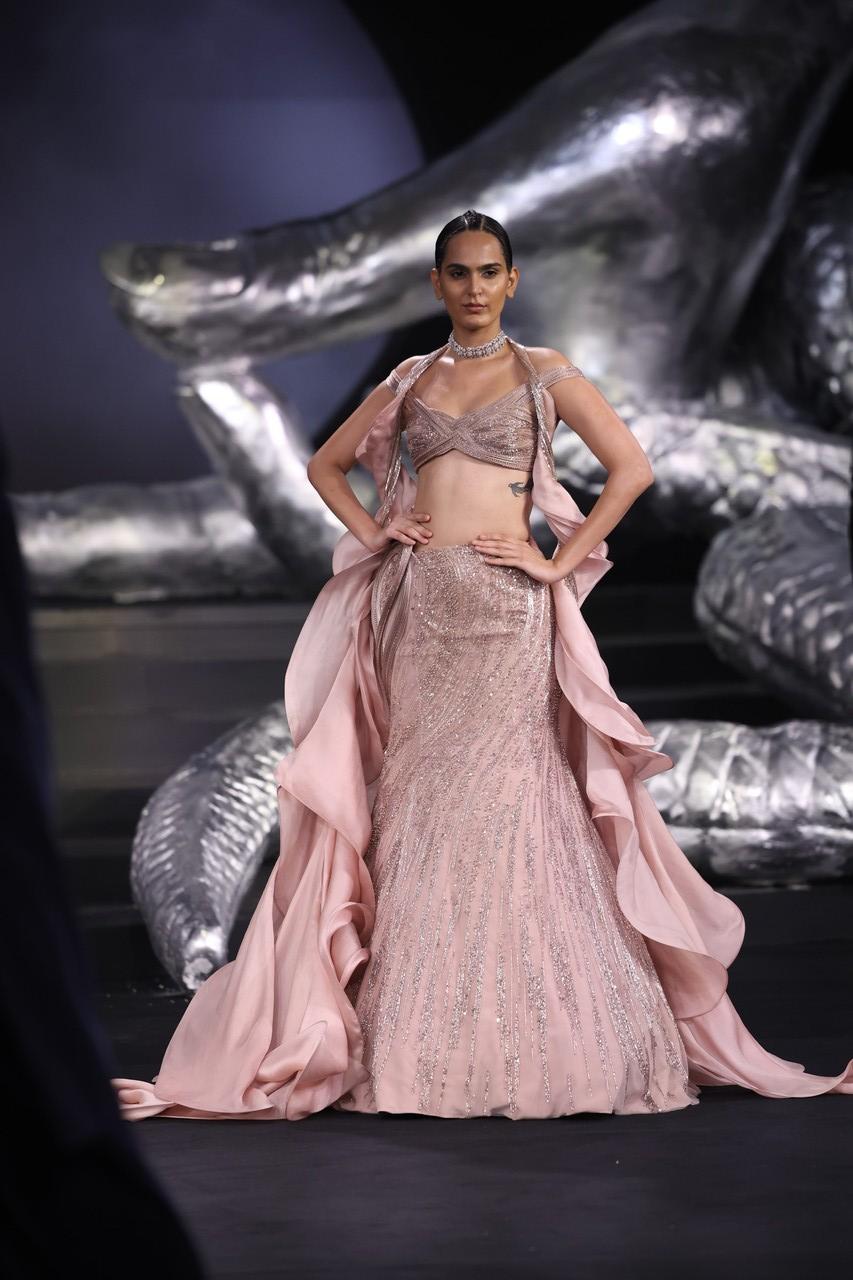 This captivating phenomenon, where the first light of day breaks the darkness, was the essence of Gaurav Gupta's India couture collection.