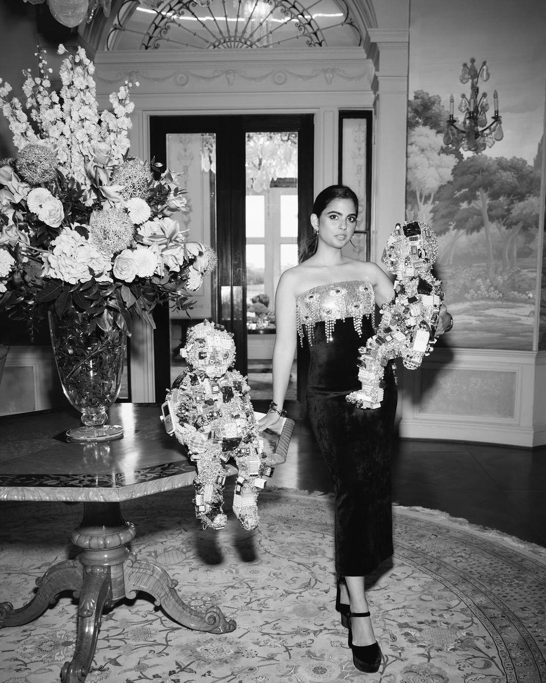 Isha Ambani posed with Schiaparelli's viral robot babies at one of Anant and Radhika's ceremonies.