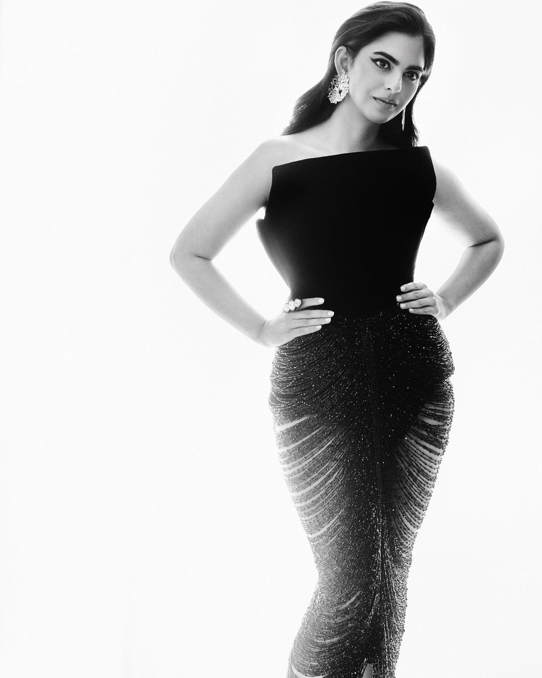 
Her all-black ensemble with intricate detailing at the bottom is by Ashi Studio from its 2024 spring/summer collection. 
