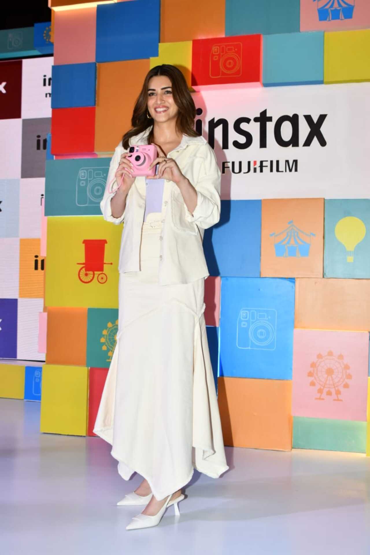 Kriti Sanon spotted in a gorgeous dress for the launch of FujiFilms camera of which she is a brand ambassador