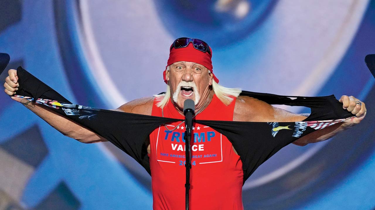 Hulk Hogan performs his iconic T-shirt rip. Pic/PTI