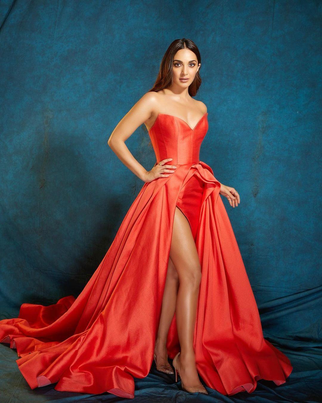 Kiara Advani stunned in a red thigh-high slit gown by international designer Mark Bumgarner.