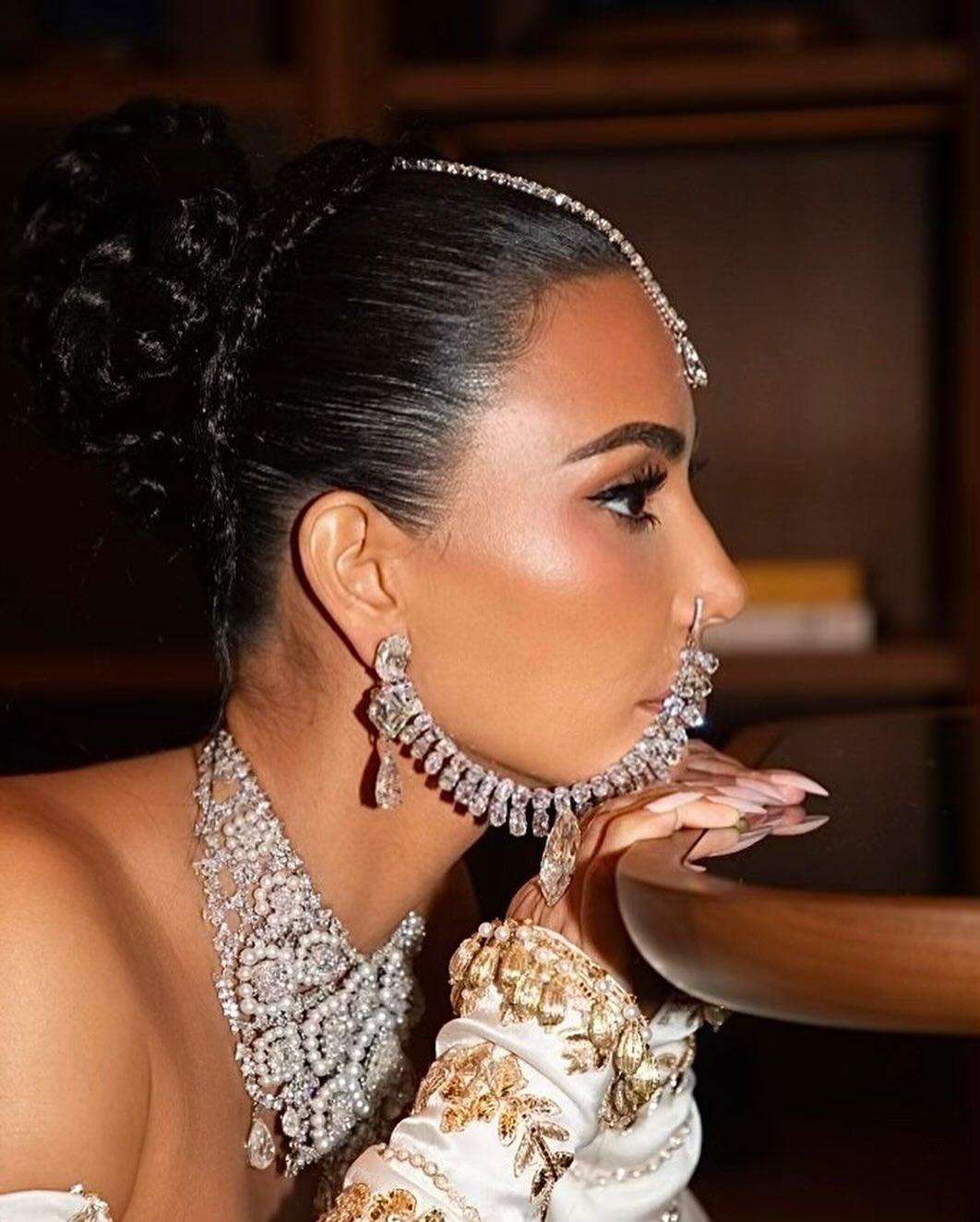 That face card! Kim rocks the Indian jewellery complete with nathani and maang tikka