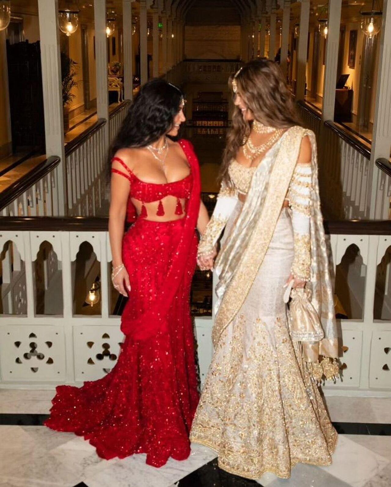 Khloe also opted for a saree. She was decked up in diamond jewellery in a white and golden ensemble. 