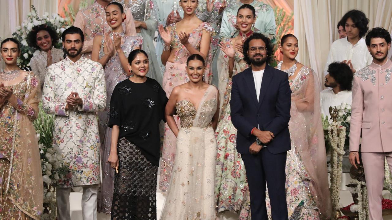 After a long hiatus, actor Lisa Ray on Sunday returned to the ramp, and that too with ace designer Rahul Mishra's show at India Couture Week 2024. She looked stunning in a saree gown that featured a captivating peacock-themed train. 