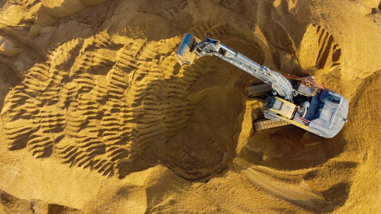 Two officials suspended for failing to stop illegal sand mining in Beed district