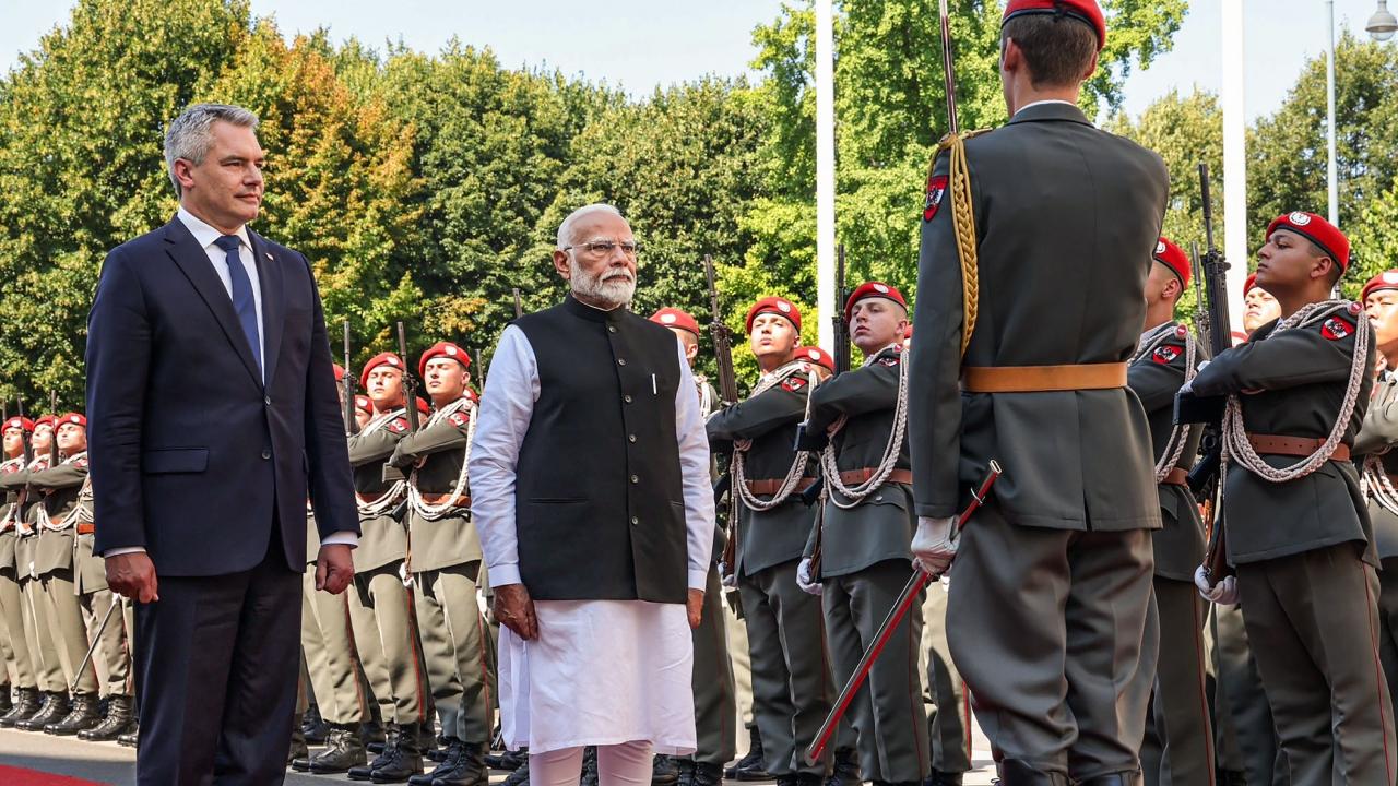 Modi was seen hugging Nehammer in one of the photos, while in another, the Austrian chancellor was seen clicking a selfie with the prime minister